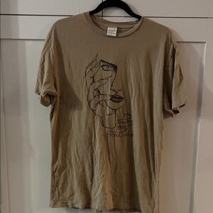 Melodie Beige Artistic Face Tee from Zumiez